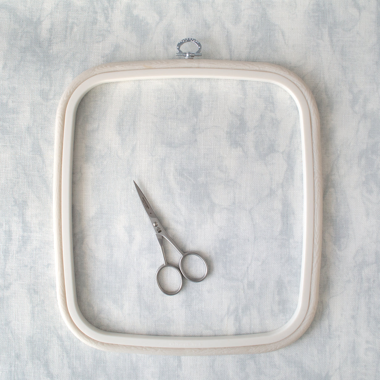 Nurge Flexi Hoop Square Frame: Elegance and Functionality in Pristine White