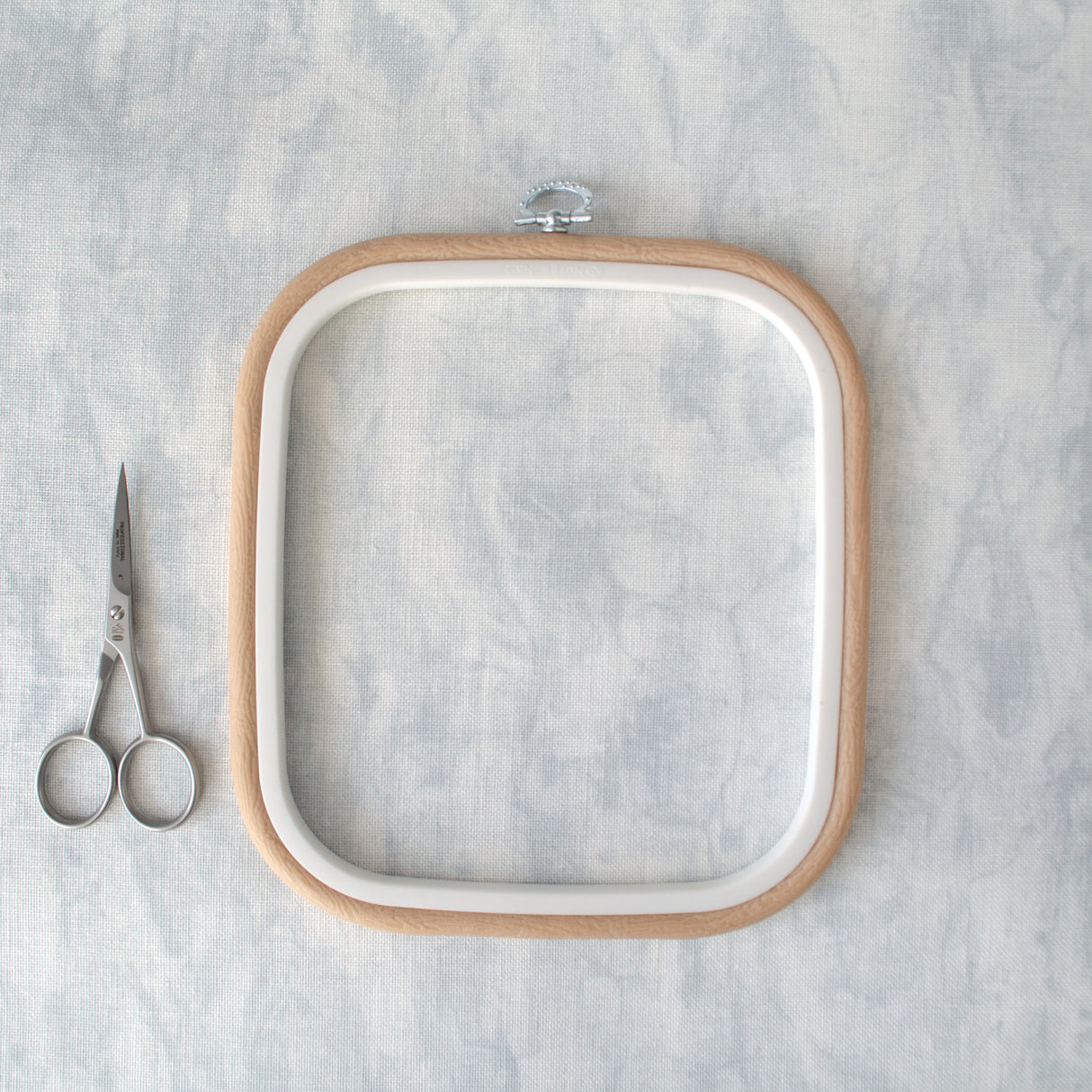 Nurge Flexi Hoop Square Frame-Frame: Elegance and Functionality in Beige
