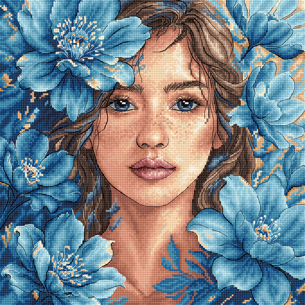 Kit de punto de cruz AVA P125 Mirada Azul con un retrato artístico de intensos ojos azules, bordado sobre tela Zweigart Aida 16 ct con hilos DMC y Luca-S.