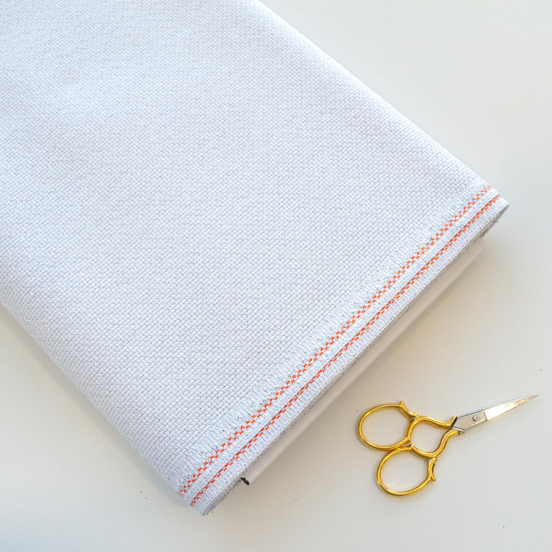 Textura de la tela Aida con brillo para bordado en punto de cruz