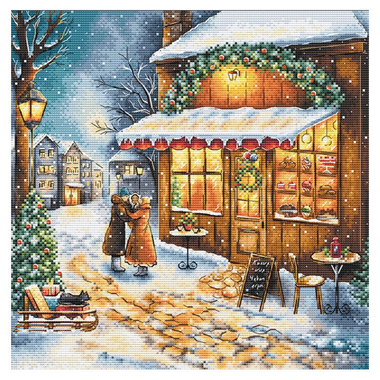 Kit de punto de cruz Andriana Esperando la fiesta SANO-35 con escena navideña de calle nevada y tienda decorada con luces y guirnaldas