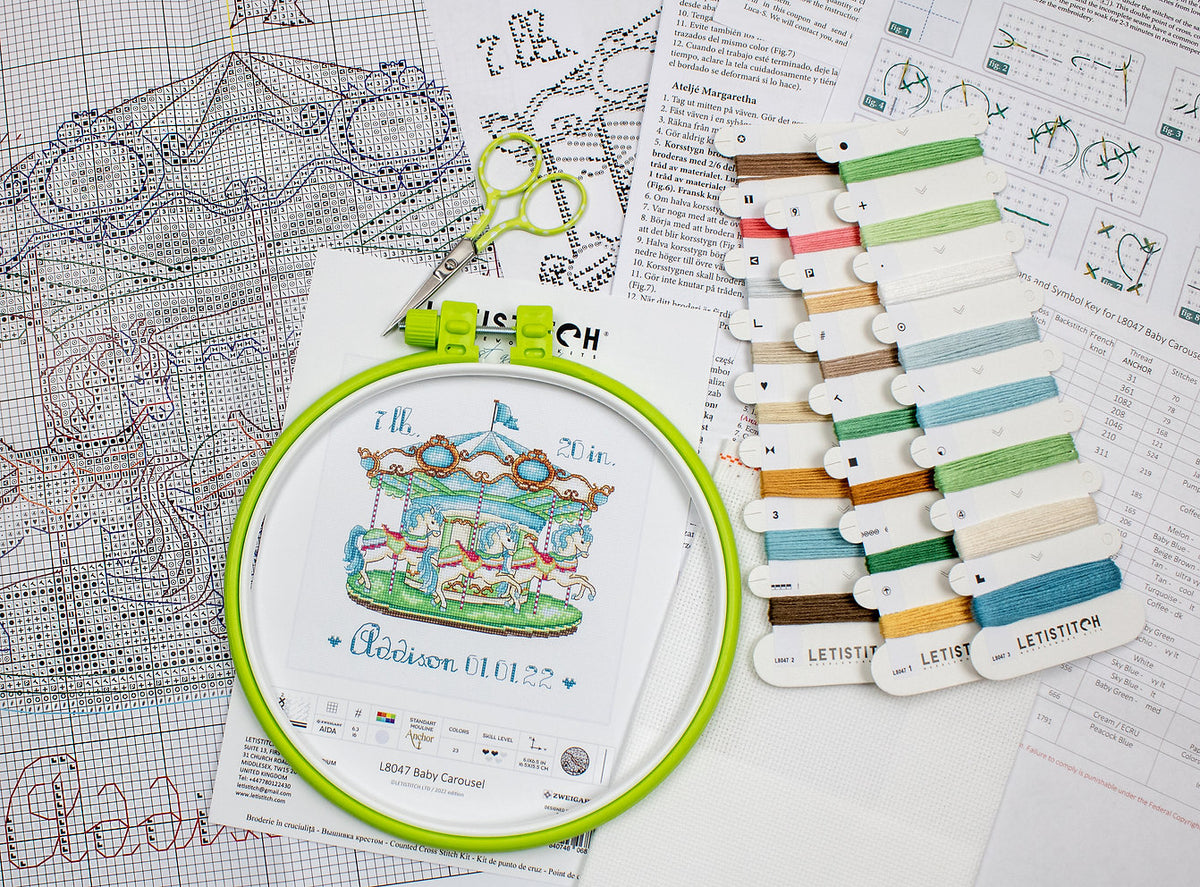 Contenido del kit: hilos, tela y aguja – Carrusel de Bebé