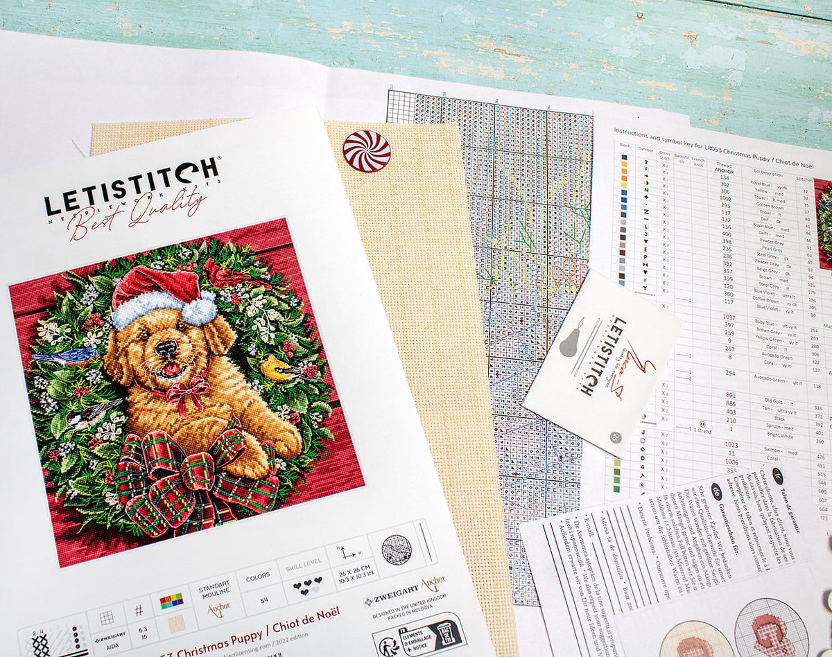 Contenido del kit: hilos, tela y aguja – Cachorro de Navidad
