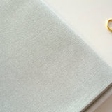 Tela Zweigart Lugana 28 ct color 3270/7095 doblada con hilo de bordar