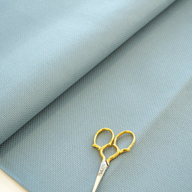 Textura de la tela Aida Zweigart 14 ct azul suave para punto de cruz